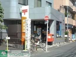 郵便局　稲田堤郵便局（郵便局）まで557m