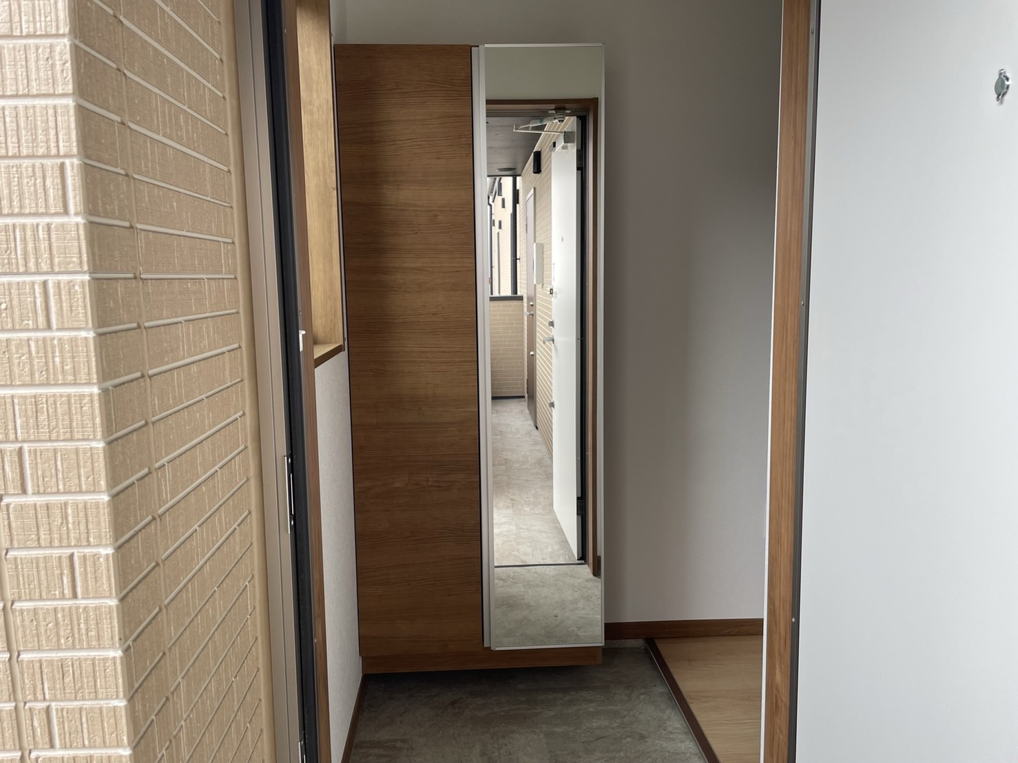 MARUHATHI HEIGHTS 104の玄関写真