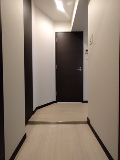 GENOVIA渋谷笹塚skygarden 203号室 2階の玄関写真