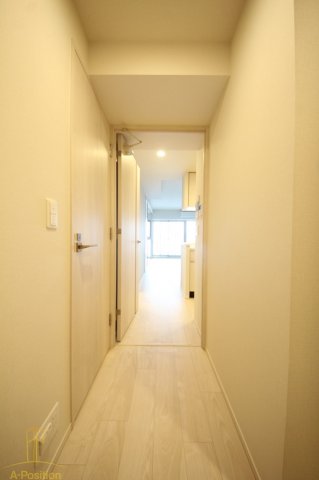 玄関　OPUS RESIDENCE SHINSAIBASHISOU