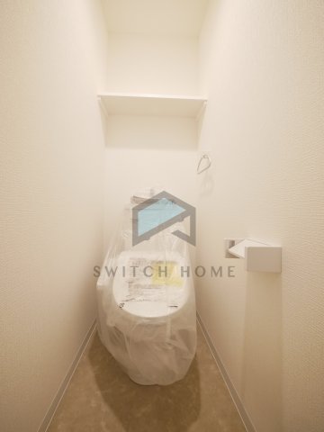 トイレ　落ち着いた色調のトイレです