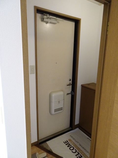 ニューセジュール竹しま Bの玄関写真