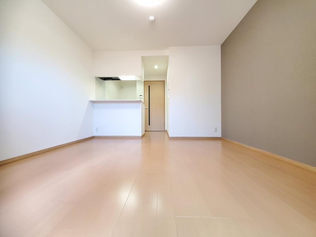 ウェルスクエア長居公園IIの居間写真