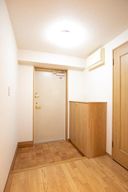 玄関　※写真は同タイプ住戸です。