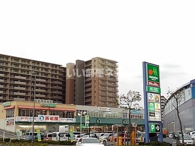 ショッピングセンター　エムズタウン（ショッピングセンター）まで323m