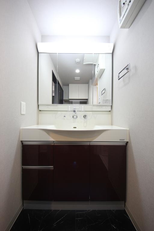 洗面設備　写真は別タイプとなります。