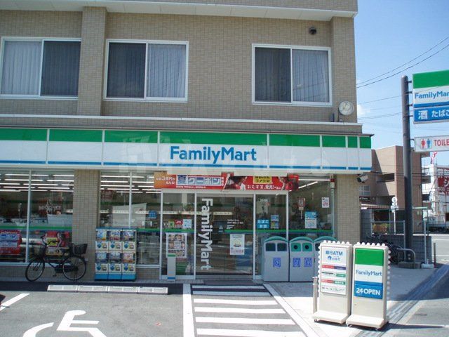 コンビニ　ファミリーマート摂津千里丘2丁目店（コンビニ）まで855m