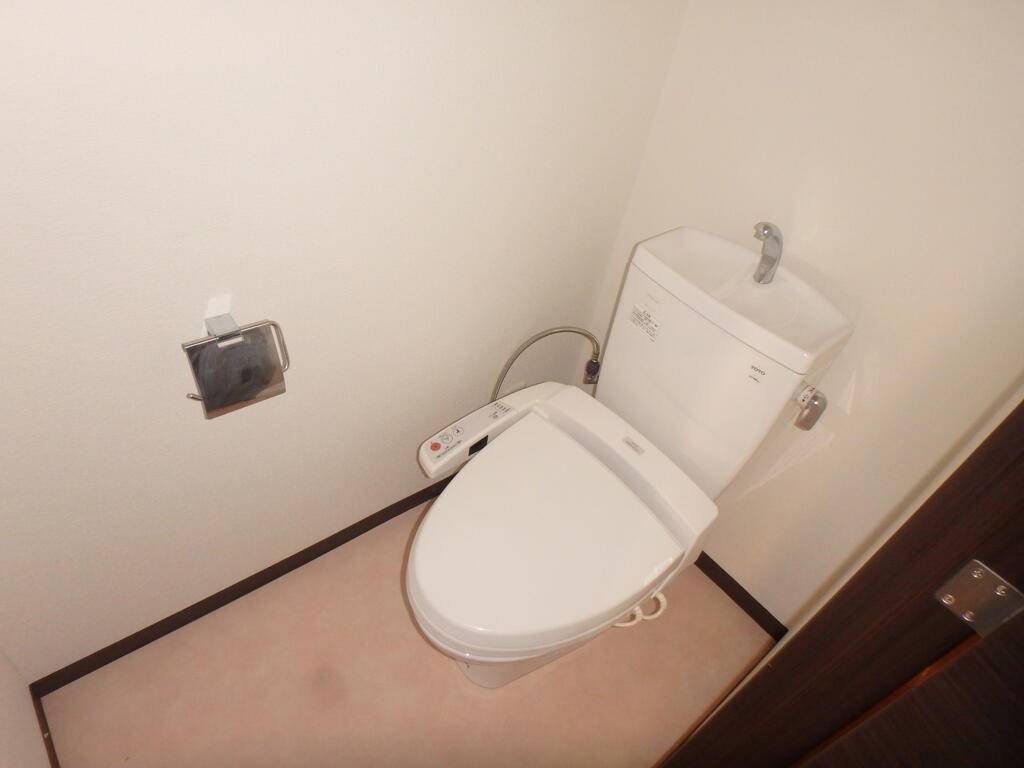 プレミスト日根野駅前ザ・フォルテージのトイレ写真