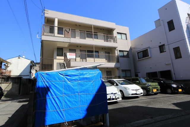 【松山市祇園町のマンションの建物外観】