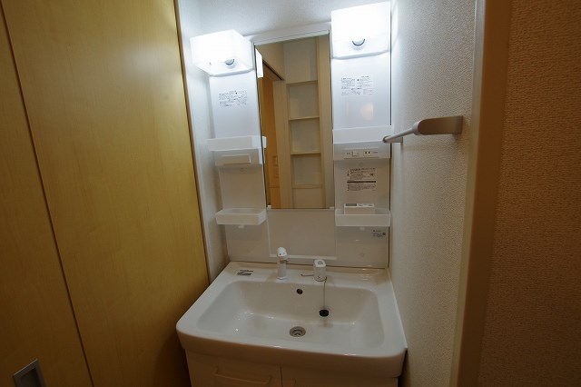 洗面設備　※203号室の写真です。