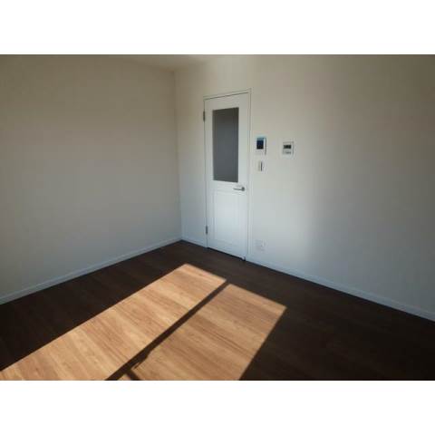 居室・リビング　アージュドール桜木の洋室