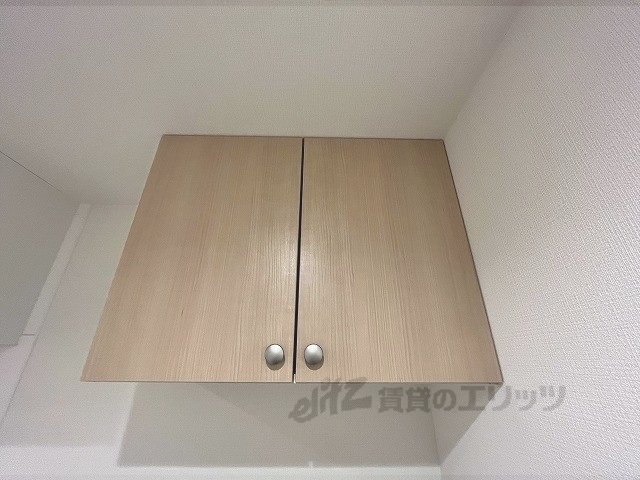 収納　洗濯機上