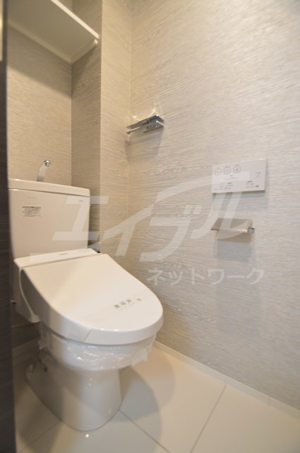 地下鉄四つ橋線 肥後橋駅 徒歩9分 15階建 築10年のトイレ写真