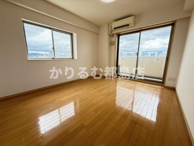 ディナスティ都島北通の居間写真