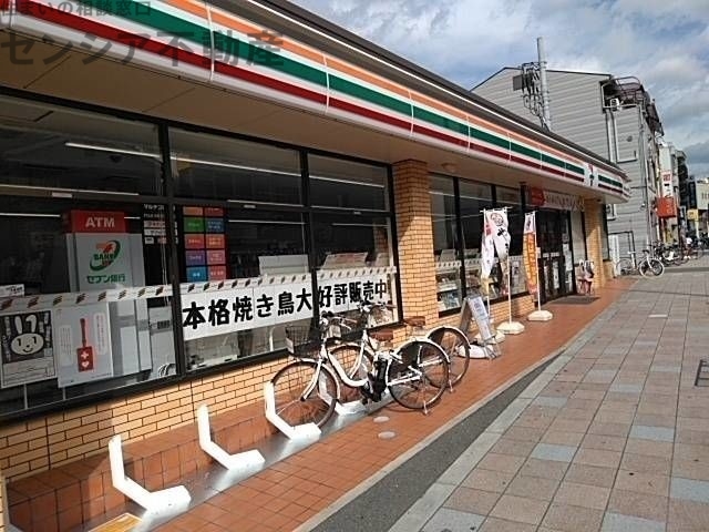 コンビニ　セブンイレブンJR放出駅西店（コンビニ）まで7m