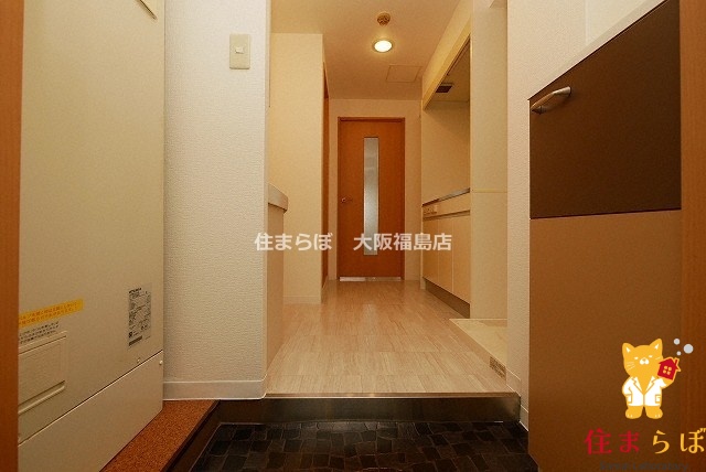 地下鉄御堂筋線 大国町駅 徒歩3分 10階建 築22年の玄関写真
