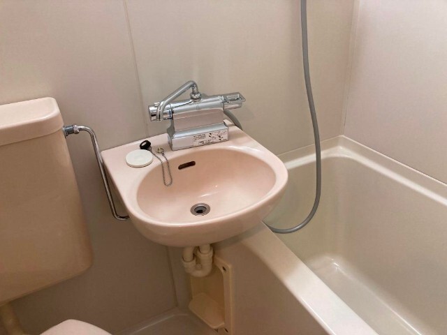 洗面設備　※工事前のお写真となります