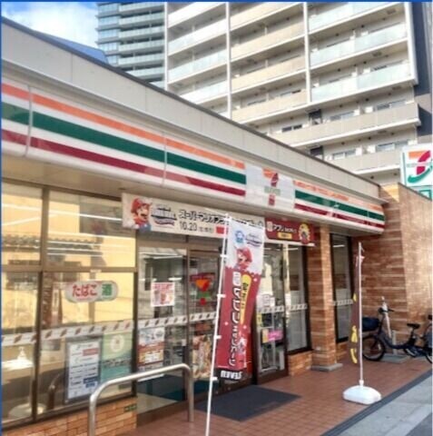 コンビニ　セブンイレブン梅田万歳町店（コンビニ）まで76m