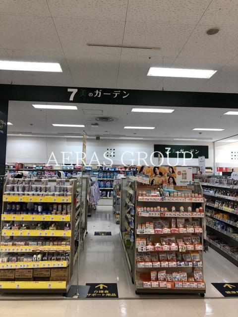 ドラックストア　セブン 美のガーデン拝島店（ドラッグストア）まで881m