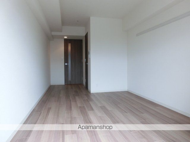 プレサンス江戸堀の居間写真