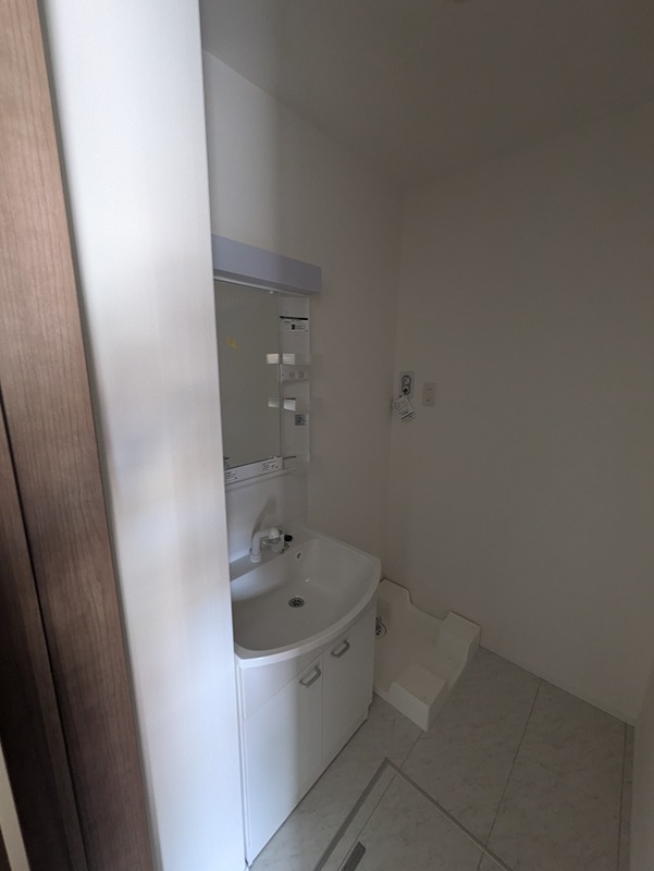 洗面設備　※室内写真は同間取りの別号室の写真です。