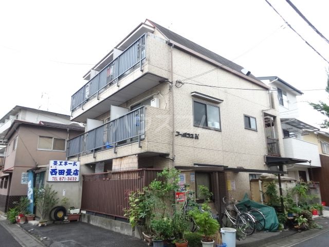 京都市右京区太秦井戸ケ尻町のマンションの建物外観