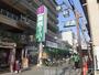 スーパー　業務スーパー十三店（スーパー）まで438m