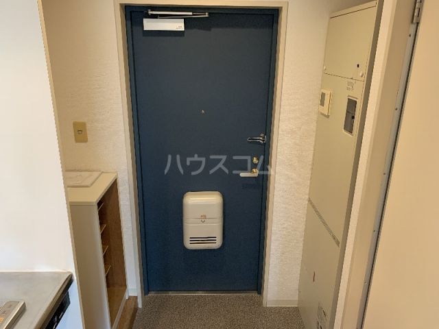 【ジュネス蛍池の玄関】