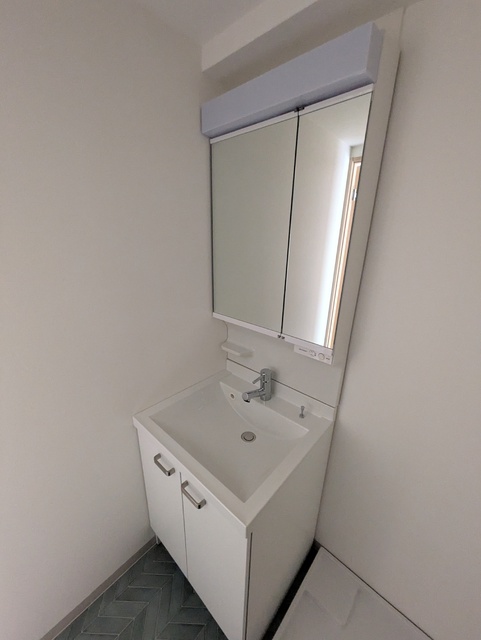 洗面設備　２０１号室の室内写真となります。