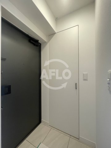 玄関　レジュールアッシュ塚本レジデンス　玄関