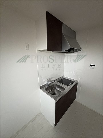 諏訪1丁目共同住宅のキッチン写真