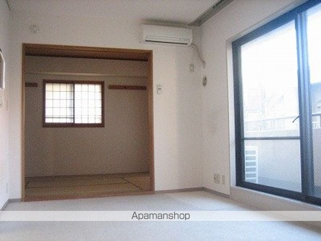ＪＲ中央線 立川駅 徒歩6分 7階建 築38年の居間写真