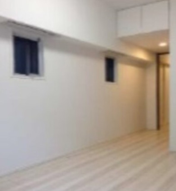 AXAS千鳥町アジールコートSta.の居間写真