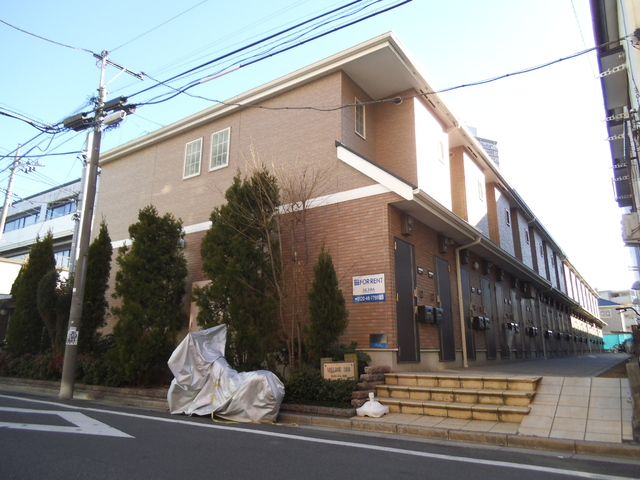建物外観　ブラウンのおしゃれなタイル貼りの建物です☆