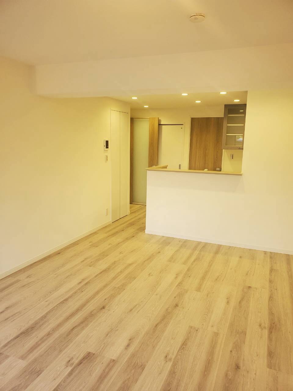 財住協13.三鷹マンションの居間写真