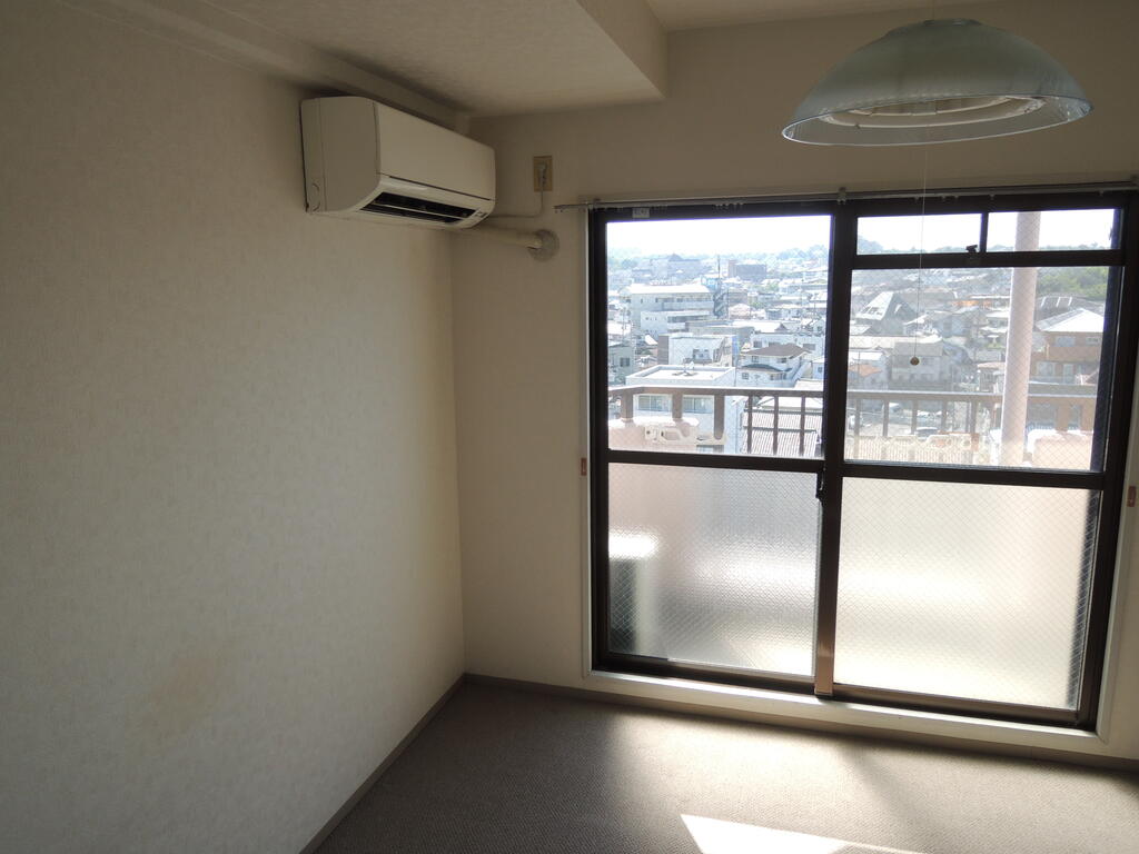 朝日プラザ河内長野デポーフロントの居間写真