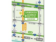 県道341号線沿いの緑の看板が目印です。